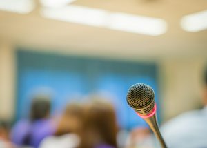 Black microphone in conference room